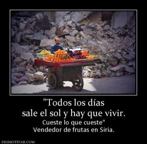 sale el sol y hay que vivir.  Cueste lo que cueste Vendedor de frutas en Siria.